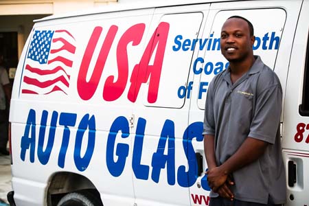 The USA auto glass staff standing near truck at Miami, Florida