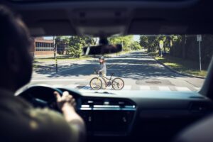 The man from the car watching the child road crossing in Homestead, FL